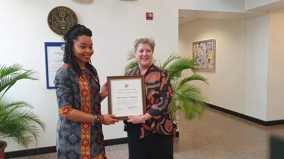 Bella Receives 2019 Staff Of The Quarter Award From US Ambassador Mary Beth Leonard